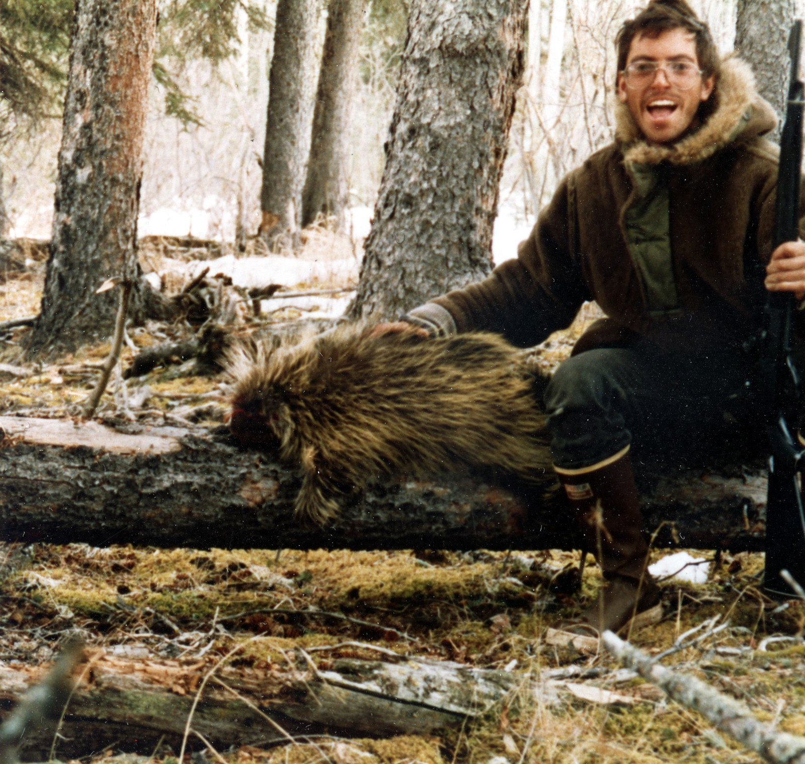 **FILE** This undated photo provided by the Villard-McCandless family shows Chris McCandless, 24, posing for a self-portrait with a porcupine. McCandless, who hiked into the Alaska wilderness in April 1992 died in there in late August 1992, was apparently poisoned by wild seeds that left him unable to fully metabolize what little food he had. Sean Penn's movie "Into the Wild" and Jon Krakauer's book of the same name is causing people from all over the world to retrace McCandless's steps to 1940s-era International Harvester bus near Healy, Alaska where his body was found. (AP Photo/Villard-McCandless family) **NO SALES**